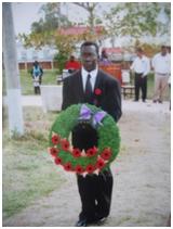 Laying a wreath, as a Guyana Legion member, at the Esplanade Gardens during a Remembrance Day ceremony